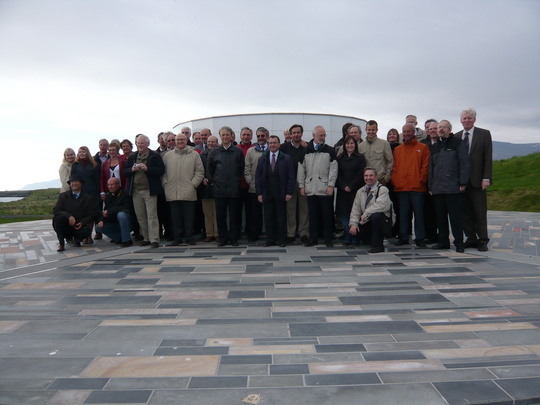 group of 40 delegates photographed outside